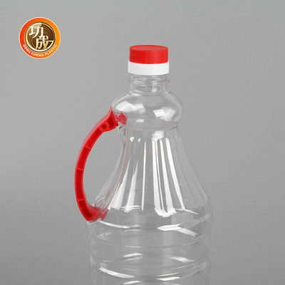 Il condimento di plastica del coperchio a vite imbottiglia la bottiglia della salsa di soia dell'ANIMALE DOMESTICO con la maniglia